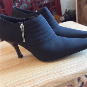 Donald pliner mint condition worn twice went for $245  size 7